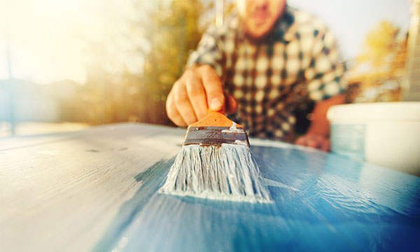 Image of a man painting